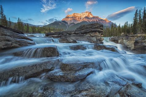 Sunset Lights Up Mount Fryatt As The Athabasca River Flows