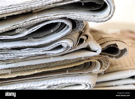 Stack Of Folded Newspapers Stock Photo Alamy