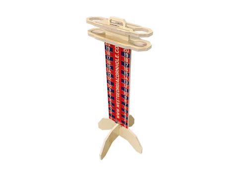 A Wooden Stand With Scissors On It And An American Flag Ribbon Hanging