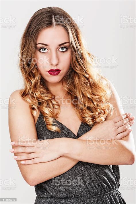 Young Confident And Looking With Big Eyes Stock Photo Download Image