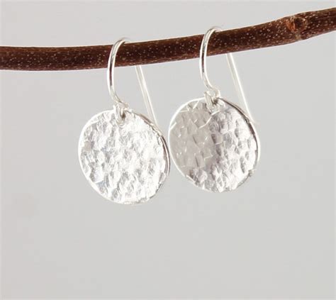 These handmade big silver hoops are created from 16 gauge sterling silver wire that has. Handmade sterling silver earrings, hammered disc earring ...