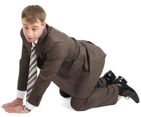 Business Man On Knees Stock Photos Pictures And Royalty Free Images Istock