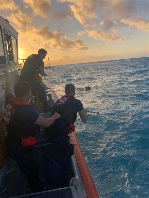 Uscg Rescues 2 From Sinking Vessel Near Key Largo