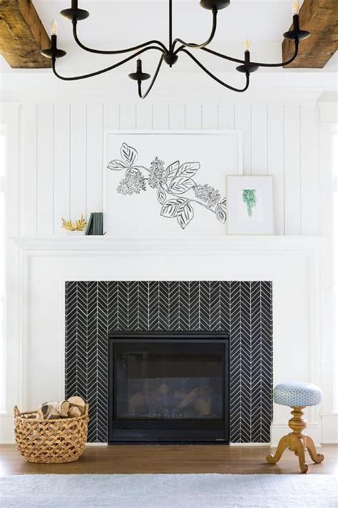Black Chevron Fireplace Surround Tiles Are Contrasted With White Grout