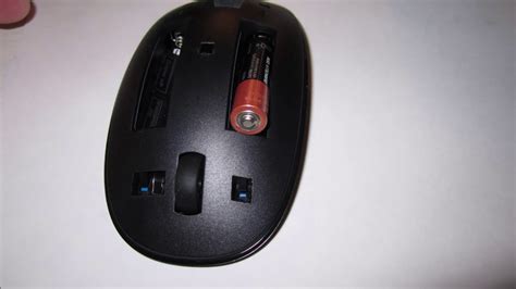 How To Put In Or Change Batteries In An Hp Wireless Mouse Youtube