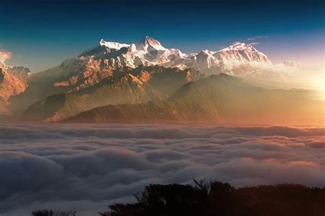 Mountain Summits Above Clouds At Sunset Gorgeous Landscape Free Image