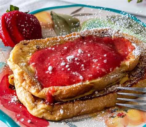 Golden French Toast With A Fresh And Delicious Strawberry Puree Syrup
