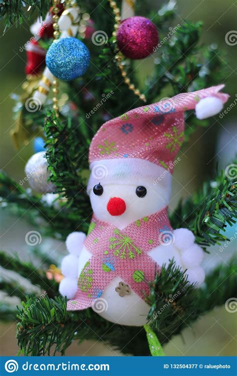 Snowman On The Christmas Tree With Decorations On Special