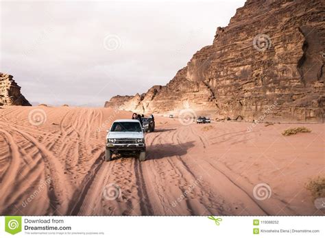 Bedouin`s Car Jeeps And Tourists In It In Wadi Rum Desert In Jordan