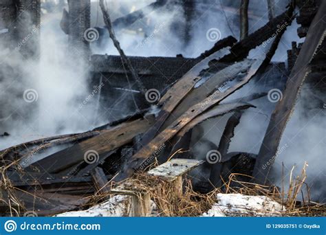 Conflagration Ruins And Remains Of A Burnt Wooden House Burnt Charred