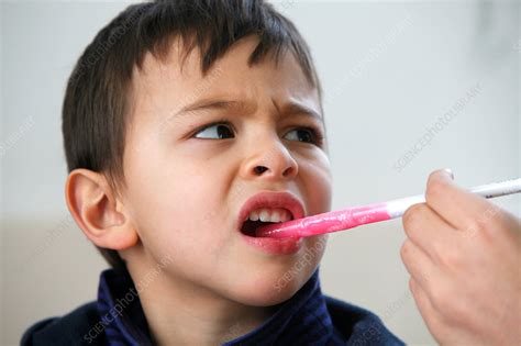 Child Taking Medication Stock Image C0142142 Science Photo Library