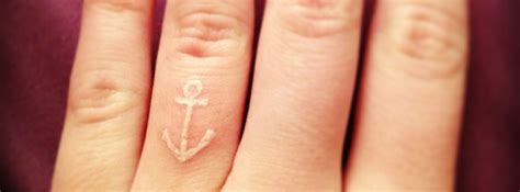 Sailors would get a 'hold fast' tattoo on their fingers in hopes that it will bring them luck when gripping rigging. Anchor Finger Tattoos - Designs and Ideas | Finger tattoo ...
