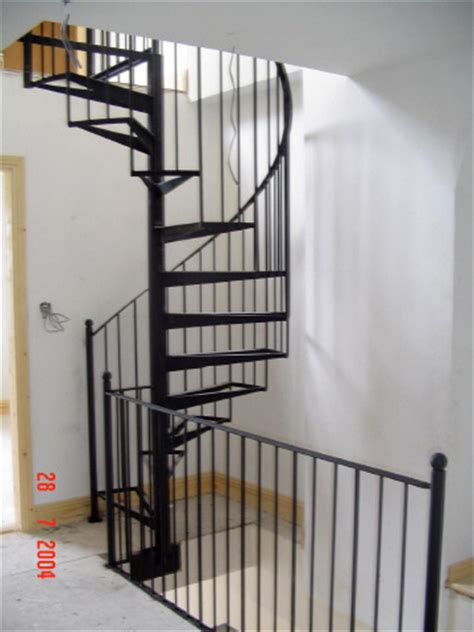 Photo courtesy of the iron shopa spiral staircase presents a compact way to negotiate levels when compared to a conventional staircase. Attic Stairs - Belton Engineering Ireland