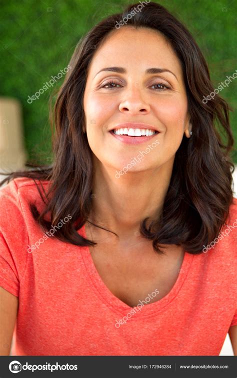 Beautiful Mature Hispanic Woman Smiling Stock Photo By Pixelheadphoto