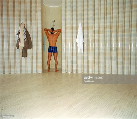 Man Taking Shower Rear View Photo Getty Images