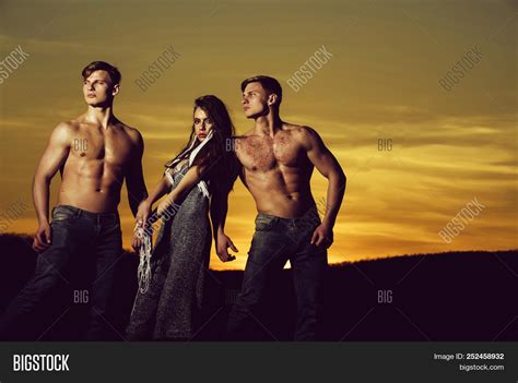 People In Sunset Macho Men Muscular Athletes Or Bodybuilders With Naked Torsos Six Packs Abs