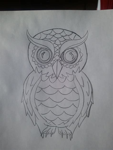 Getting This Tattooed With Green Eyes And Colored Feathers Along With A