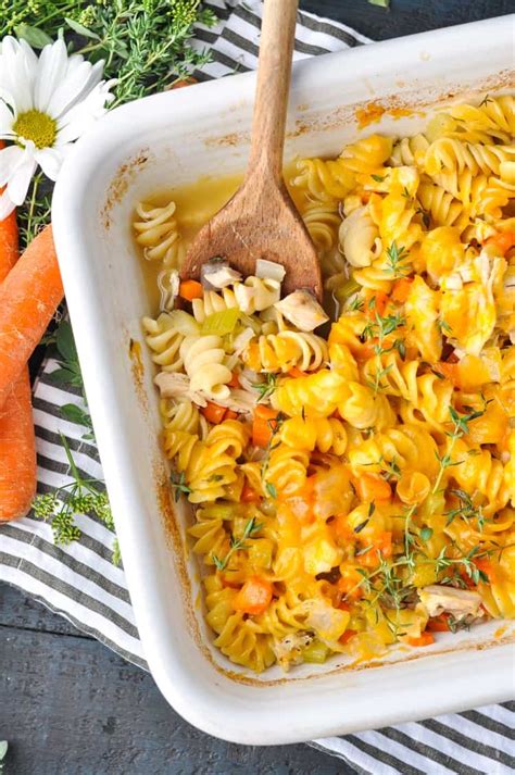 In a medium bowl, stir together soup, water or milk, seasonings, and vegetables. Dump and Bake Chicken Noodle Casserole - The Seasoned Mom
