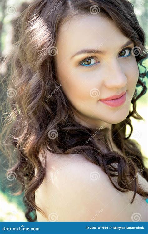 Portrait Of A Beautiful Brown Eyed Girl In Nature Stock Photo Image