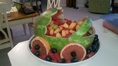 It's always good to serve fruit at a party, but how about displaying it in a fun way for something a little bit different. Baby carriage watermelon fruit bowl for Nicole's baby ...
