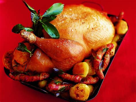 Roast Turkey With Spiced Cranberry Bacon And Walnut Stuffing