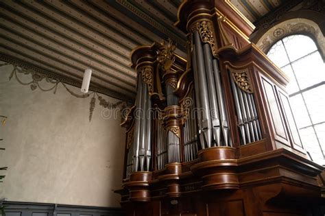 Huge Old Pipe Organ In Medieval Cathedral Chapel Church In Switzerland