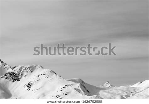 High Mountains Snowy Peak Sunlit Cloudy Stock Photo 1626702055