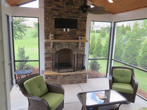 Screened Porch With Wood Burning Fireplace And Paver Patio — Deckscapes