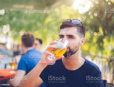 Young Man Drinking Beer Stock Photo Download Image Now Beer