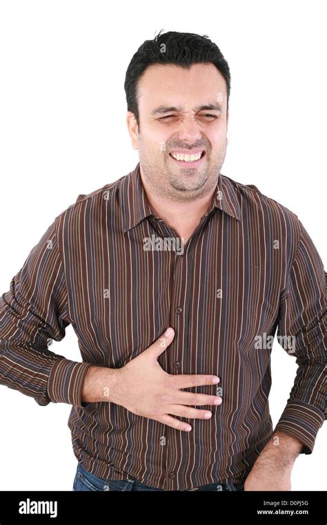 Young Man Suffering From A Bad Stomach Ache Pain Isolated On White