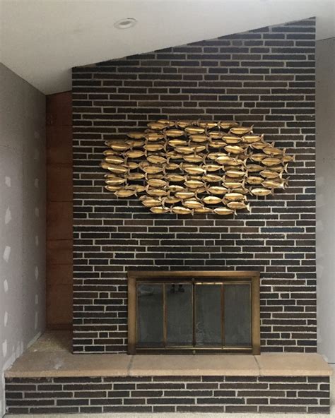 We'd like to remove the top two rows of brick to lower our mantel (we want the tv above, but this is a wood burning fireplace that has a gas insert. OH Mid Mod our adventure in renovating a Toledo Mid Century Modern home