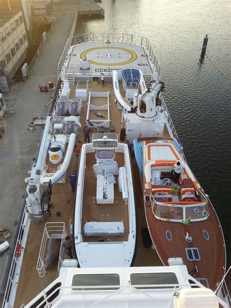 Millionaires Need This 200 Foot Ship To Carry All Their Mega Yachts