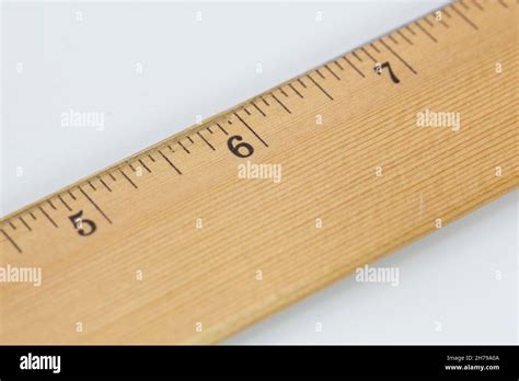 Close Up Of A Wooden Ruler Centered Around The 6 Inches Mark Stock