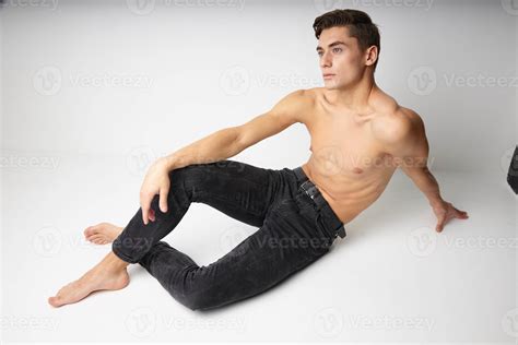 Man Sitting On The Floor Naked Torso Casual Wear Isolated Background
