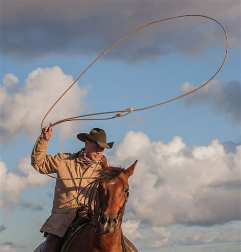 Cowboy On Horseback Preparing To Throw His Lasso Smithsonian Photo