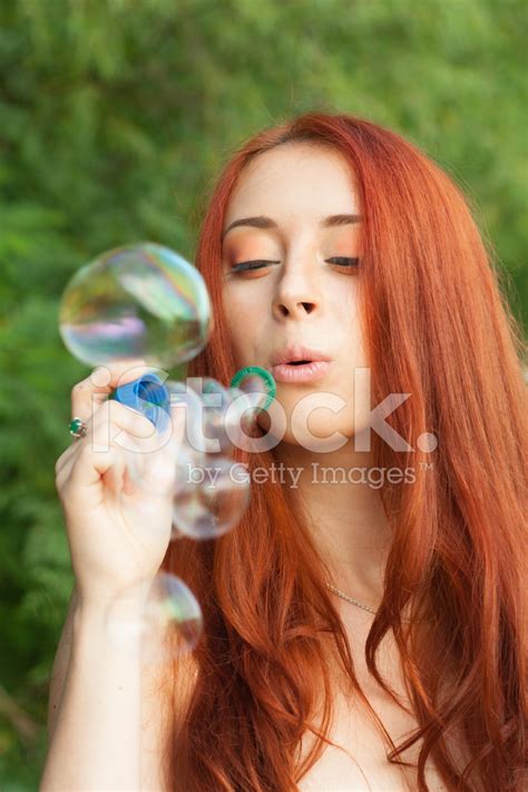 Young Girl Blowing Bubbles Stock Photo Royalty Free Freeimages