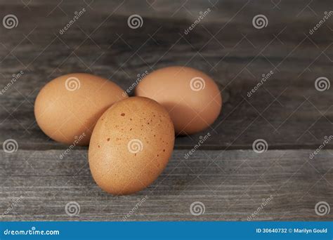 Three Brown Chicken Eggs Stock Photo Image Of Eggs Wooden 30640732
