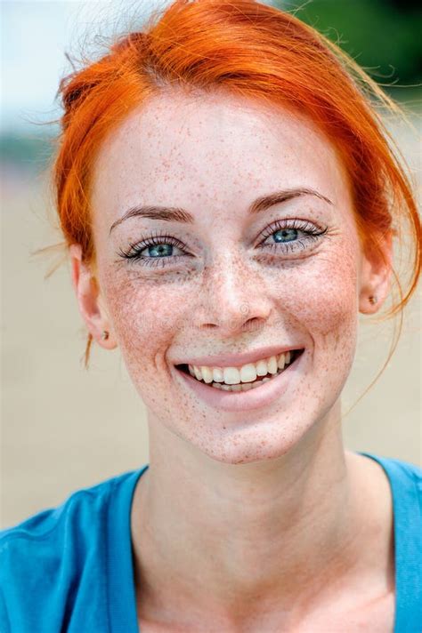 Beautiful Young Redhead Woman With Clean Fresh Skin Face Closeup