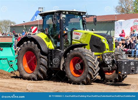 German Claas Axion Tractor Drives On Track By A Traktor Pulling Event