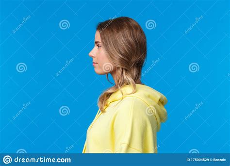 Close Up Profile Portrait Of Serious Looking Attractive Young Caucasian
