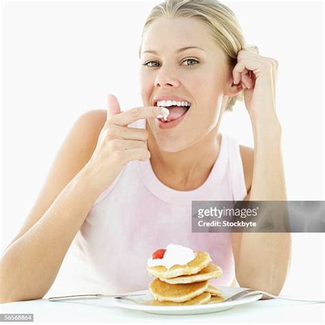 Licking Finger Woman Photos And Premium High Res Pictures Getty Images