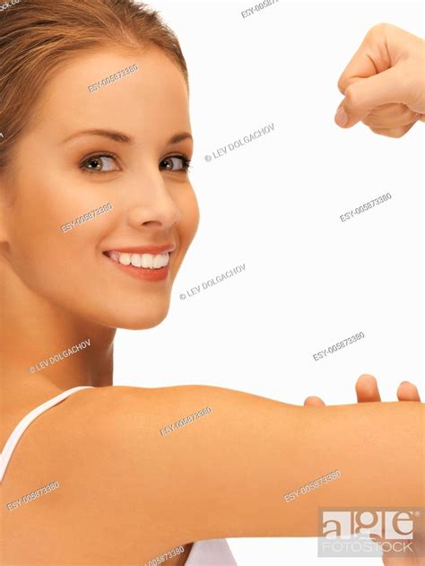 Closeup Picture Of Sporty Woman Flexing Her Biceps Stock Photo