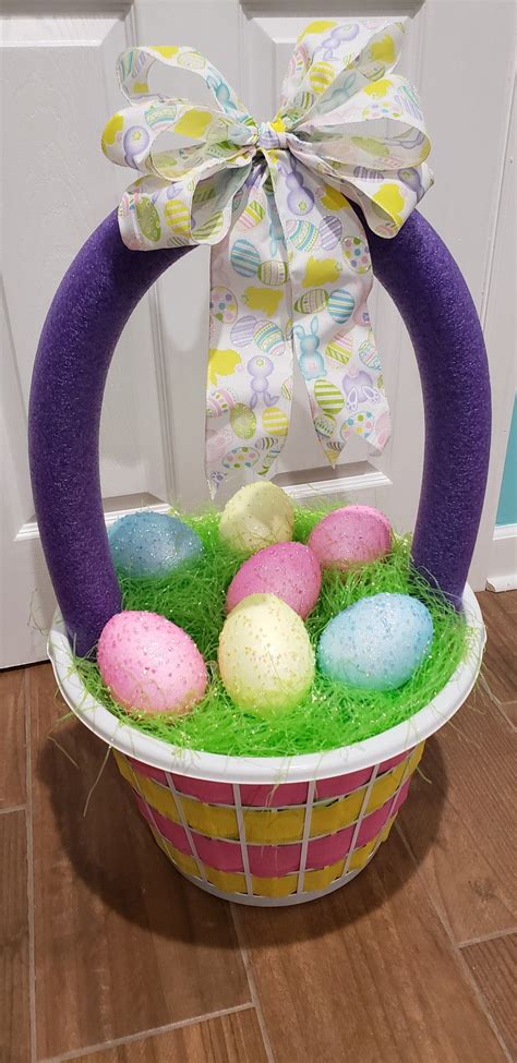 dollar and 25 cent store diy giant easter egg basket made with a laundry basket and pool