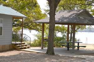 The nightly rental fee includes a trip up to 6 people. Joe Pool Lake Fishing Cabins | Lakefront one and 2 bedroom ...