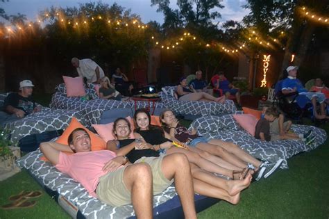 outdoor movie night with air mattresses backyard movie party backyard movie nights outdoor