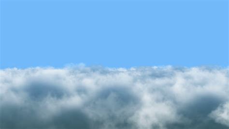 Flying Through Dense Clouds With Blue Sky Stock Motion Graphics Sbv