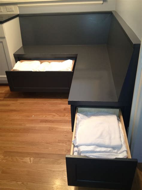 I've seen 18 recommended and then i read an interior desig. Storage for table linens under custom built-in corner ...