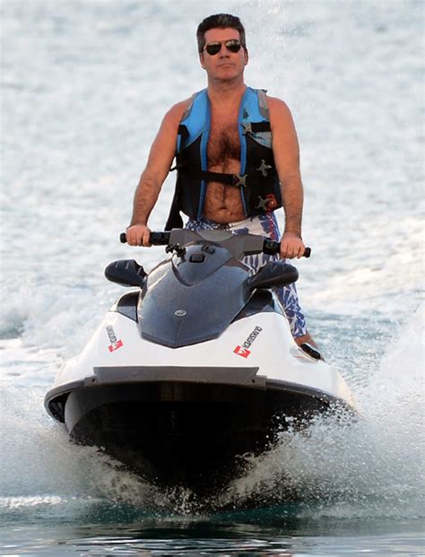 simon cowell and lauren silverman ride jet skis on holiday in barbados aol