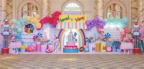 A Birthday Party Setup With Balloons And Decorations