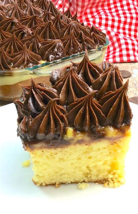Before we made the homemade eclairs, this super simple boston cream poke cake was his favorite. Boston Cream Pie Poke Cake - In the Kids' Kitchen